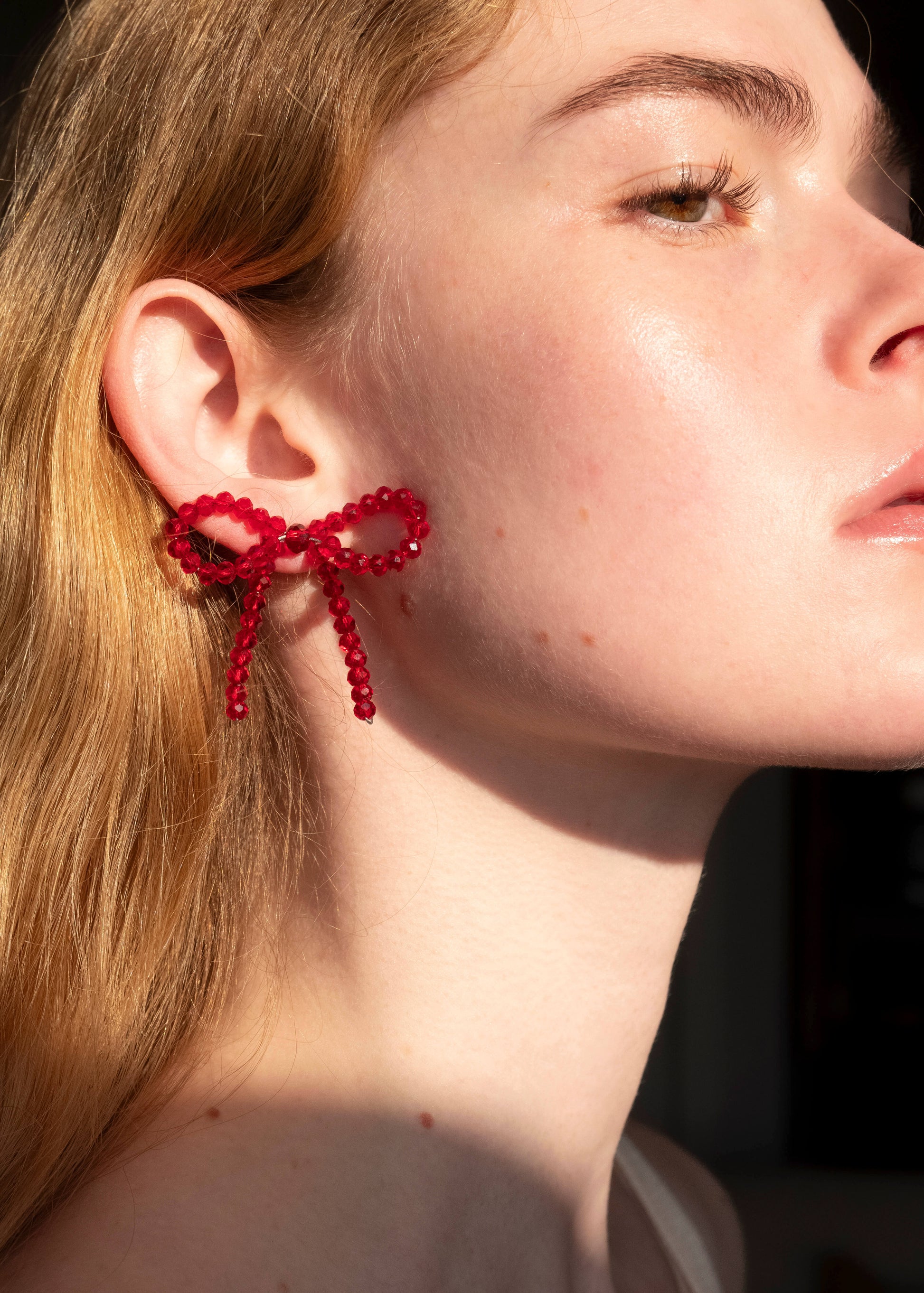 red bow earrings