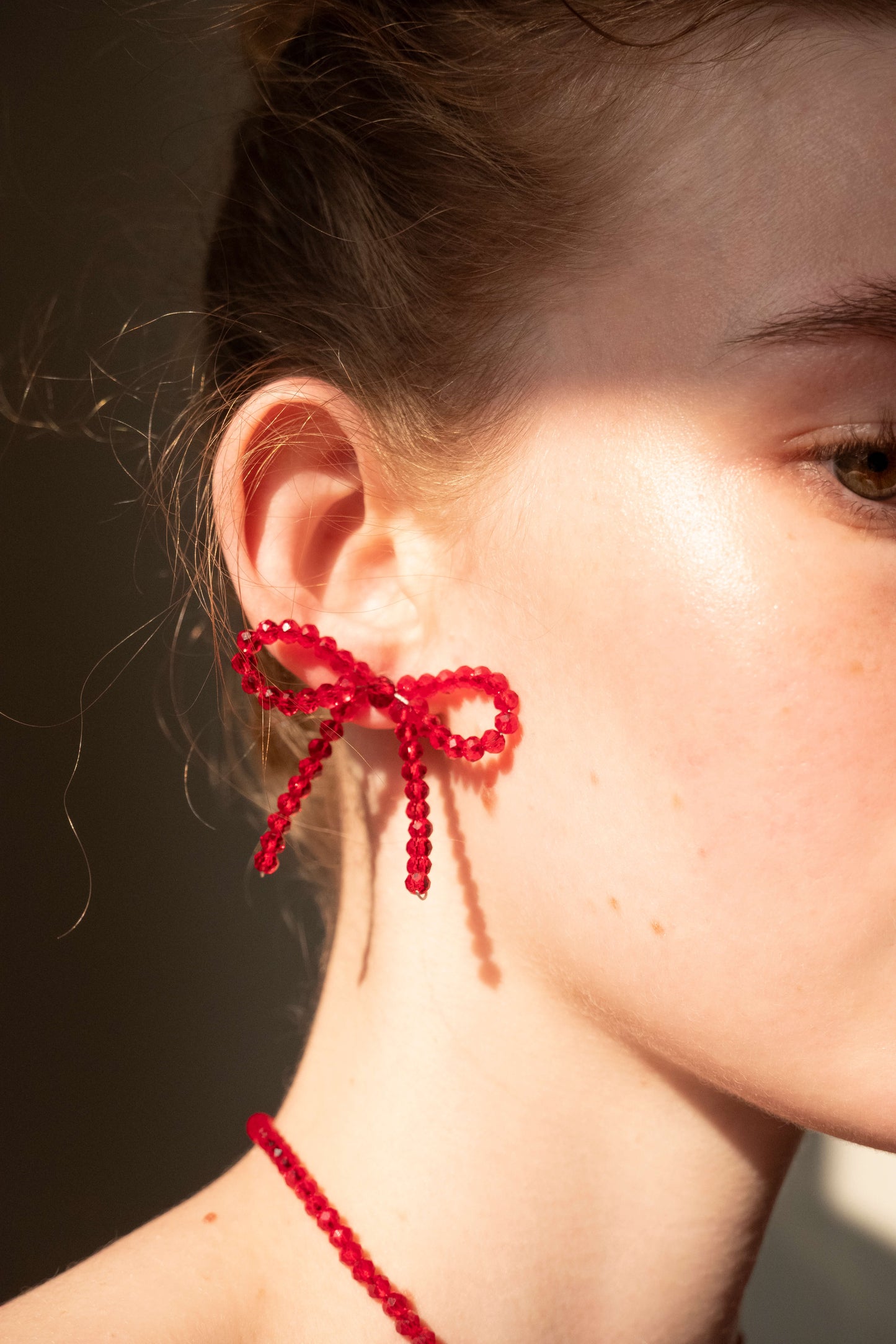 red bow earrings