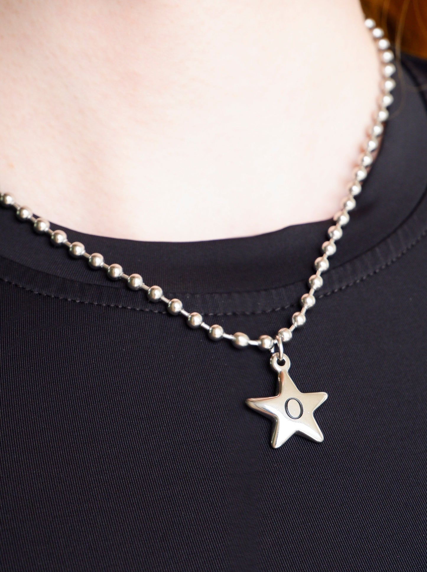 star initial necklace on a stainless steel ball chain