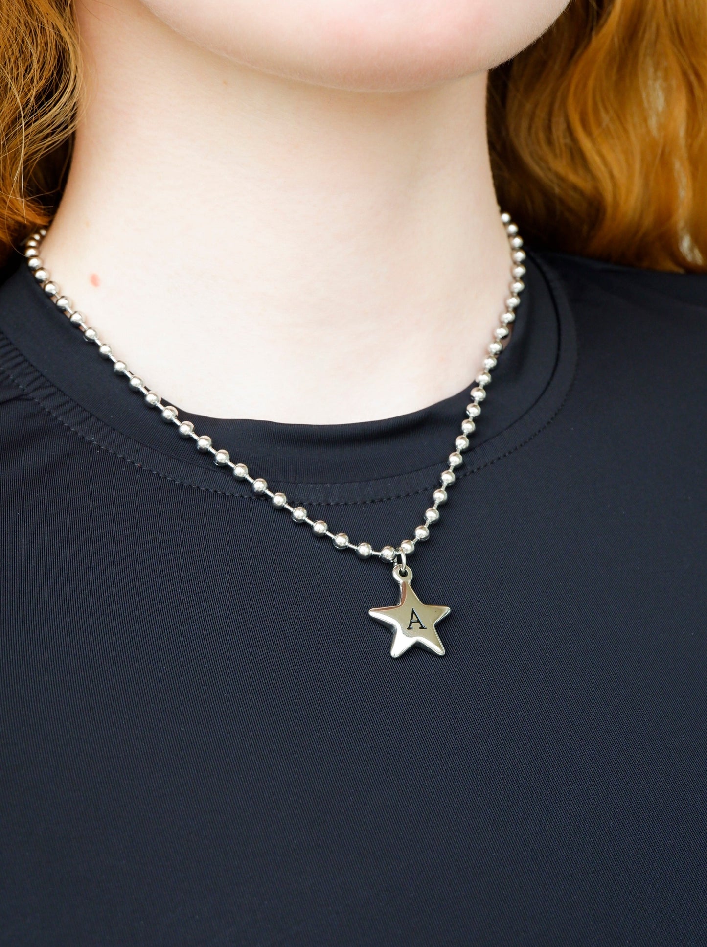 star initial necklace on a stainless steel ball chain