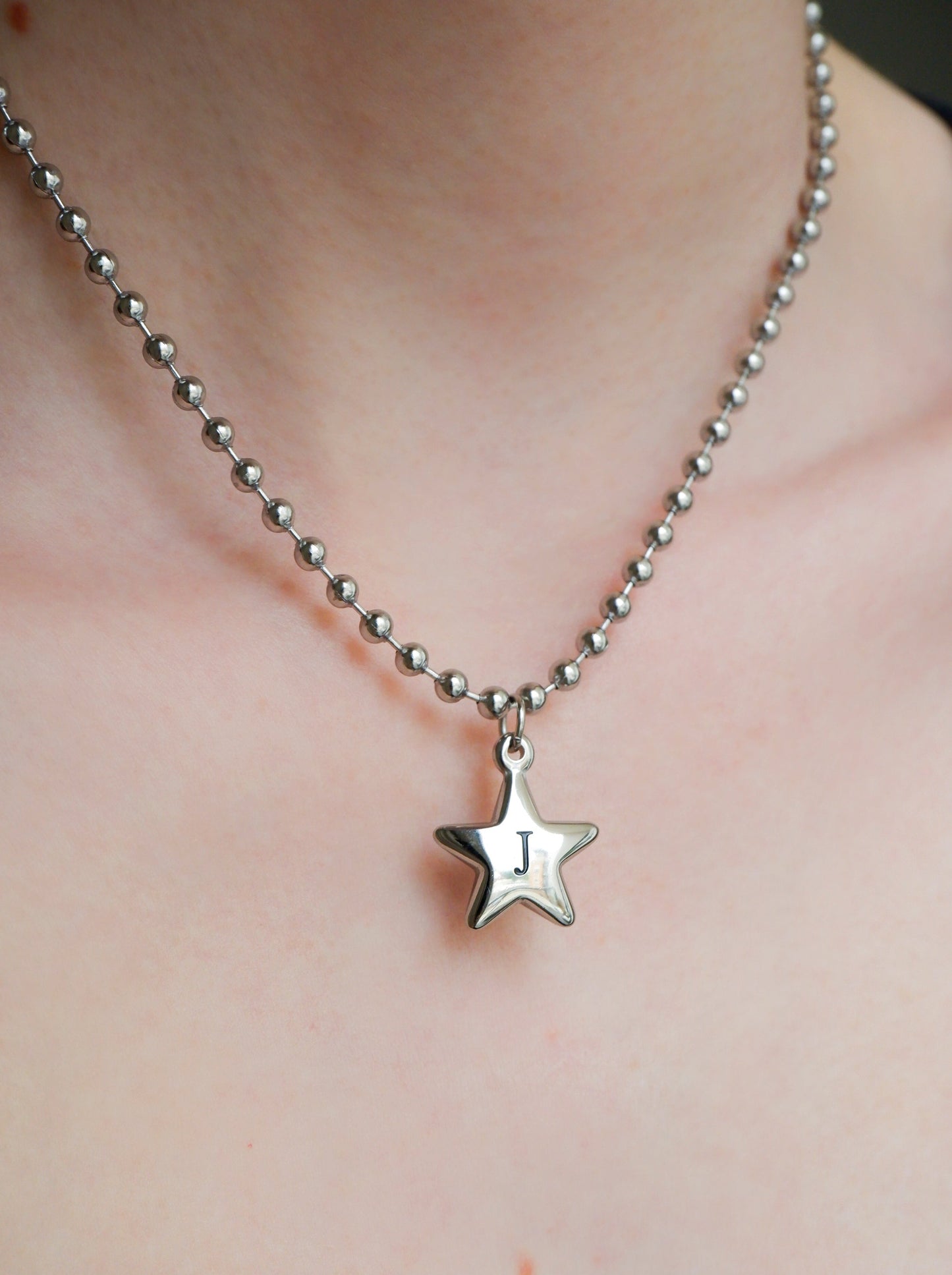 star initial necklace on a stainless steel ball chain