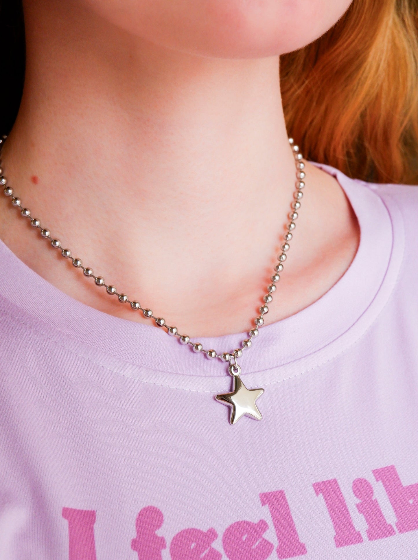 star necklace on a stainless steel ball chain