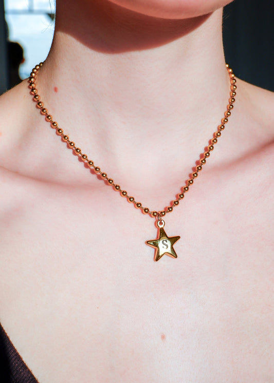 gold initial star necklace on a ball chain